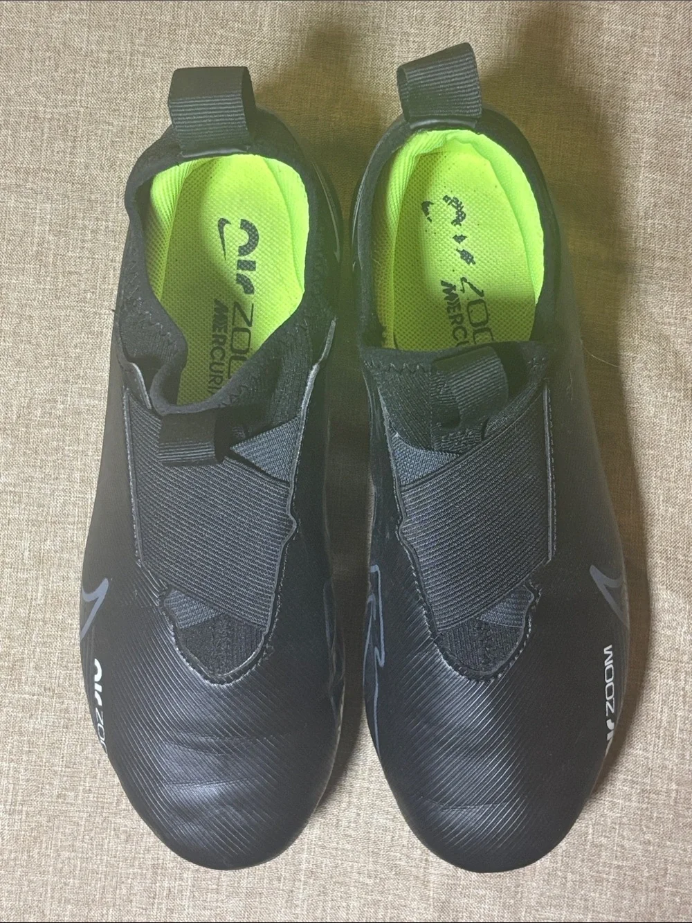 Kid’s Black Athletic Slip-On Cleats with Neon Green Lining